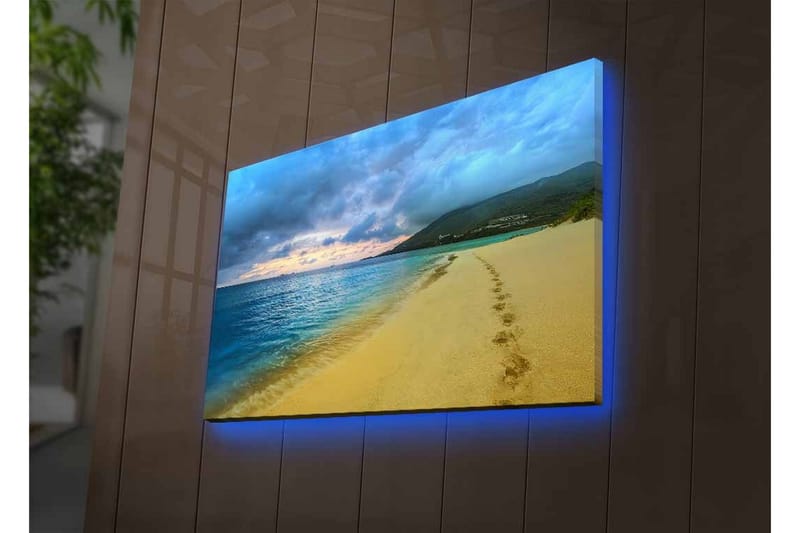Canvastavla med LED-belysning - Vacker strand med fotspår i sanden och en dramatisk himmel - Blå / Sandgul / Grå - Inredning - Tavlor & konst - Canvastavlor