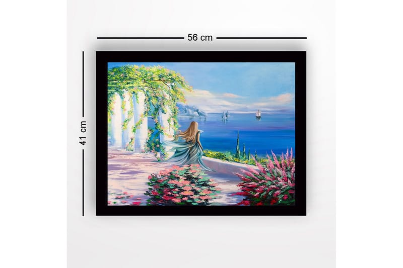 Inramad Canvastavla i trä - 41x56 cm - Kvinna i blå klänning som blickar ut över havet med blommor i förgrunden - Blå / Grön / Rosa - Inredning - Tavlor & konst