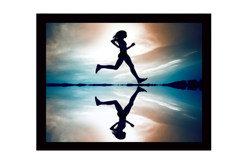 Inramad Canvastavla i trä - 41x56 cm - Silhuett av en löpare i rörelse över en spegelblanka yta - Mörkblå / Orange / Ljusblå - Inredning - Tavlor & konst