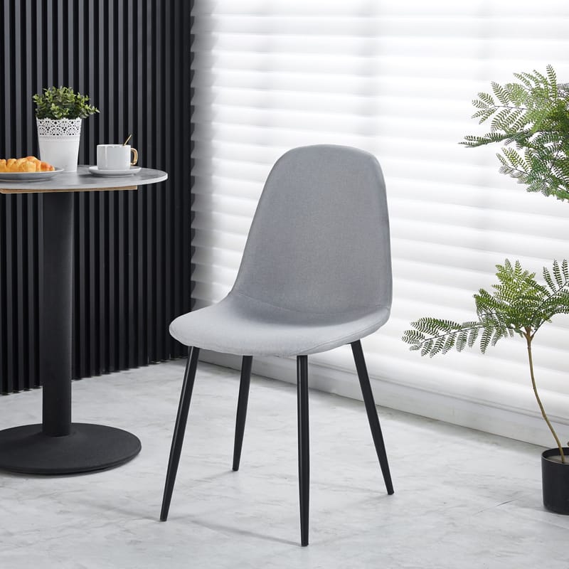 Stol i grått tyg - Carisma - grå - Möbler - Stolar & fåtöljer - Matstol & köksstol